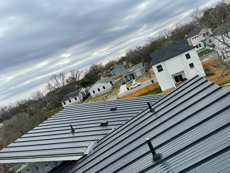 Standing seam metal roof panels with vents for Skylight Repair in Escanaba